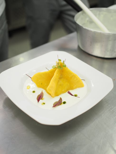 Plated gourmet food in modern restaurant setting